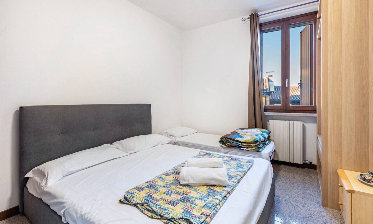 Pizzoletta Apartment | Room 'Tripla Budget' with Shared Terrace, Wi-Fi and Air Conditioning