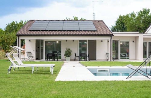 Borgo Milano Apartment | Armonia Suites Terra, new apartment with garden and pool in Verona